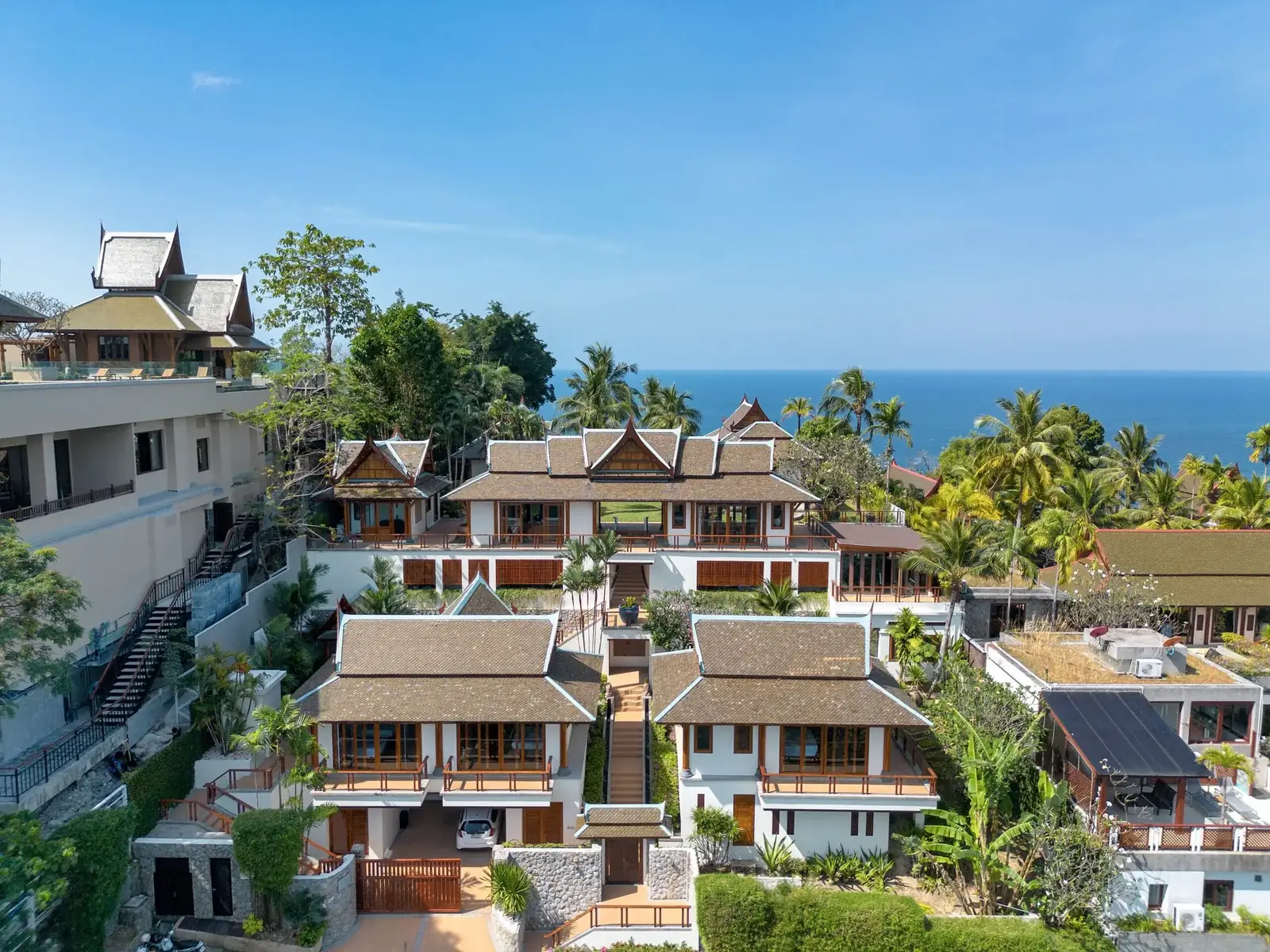 Aerial villa estate with ocean view