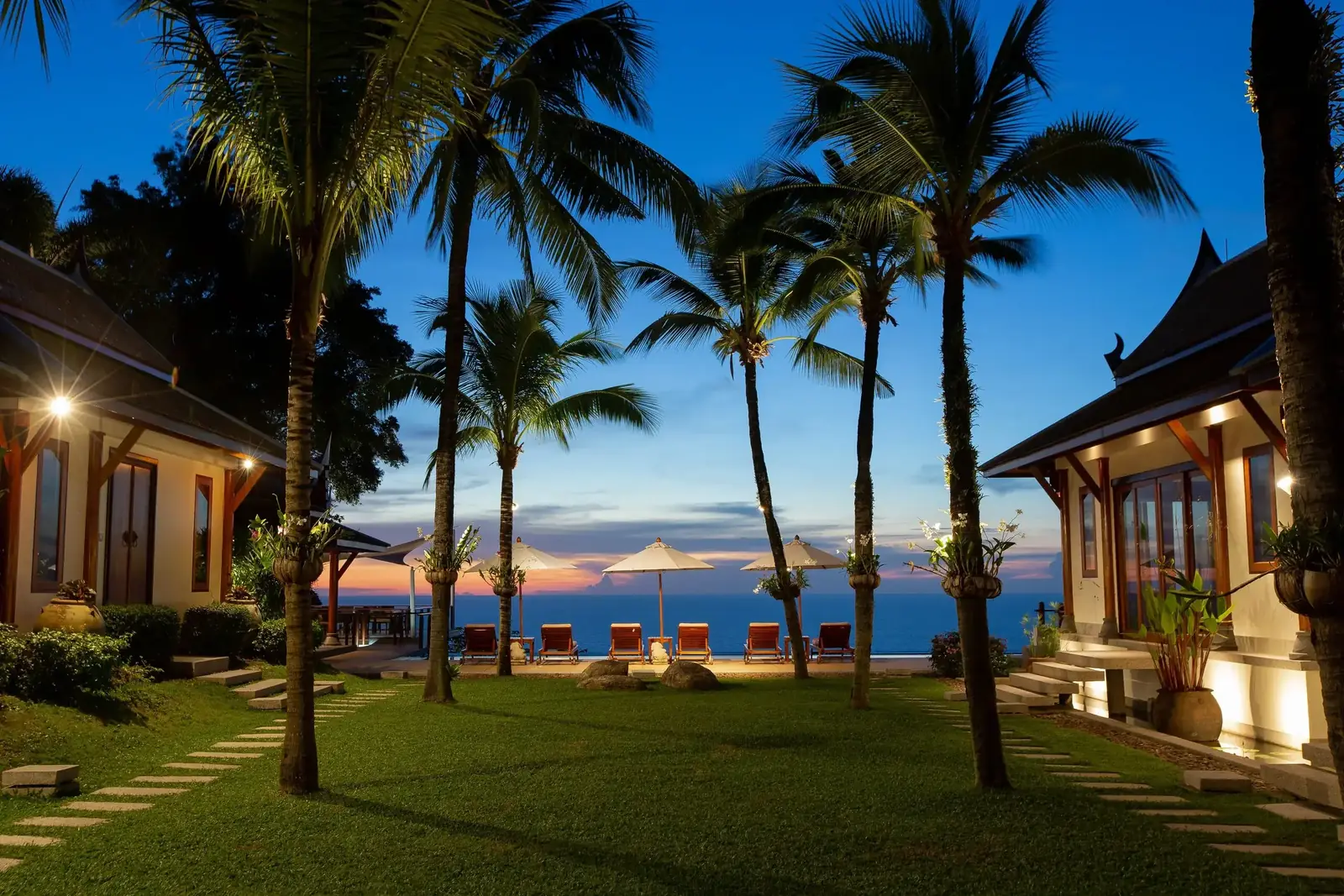 Central lawn at dusk with ocean horizon