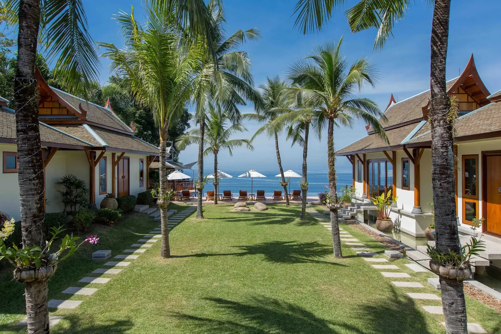 Central lawn between Thai pavilions leading to the ocean
