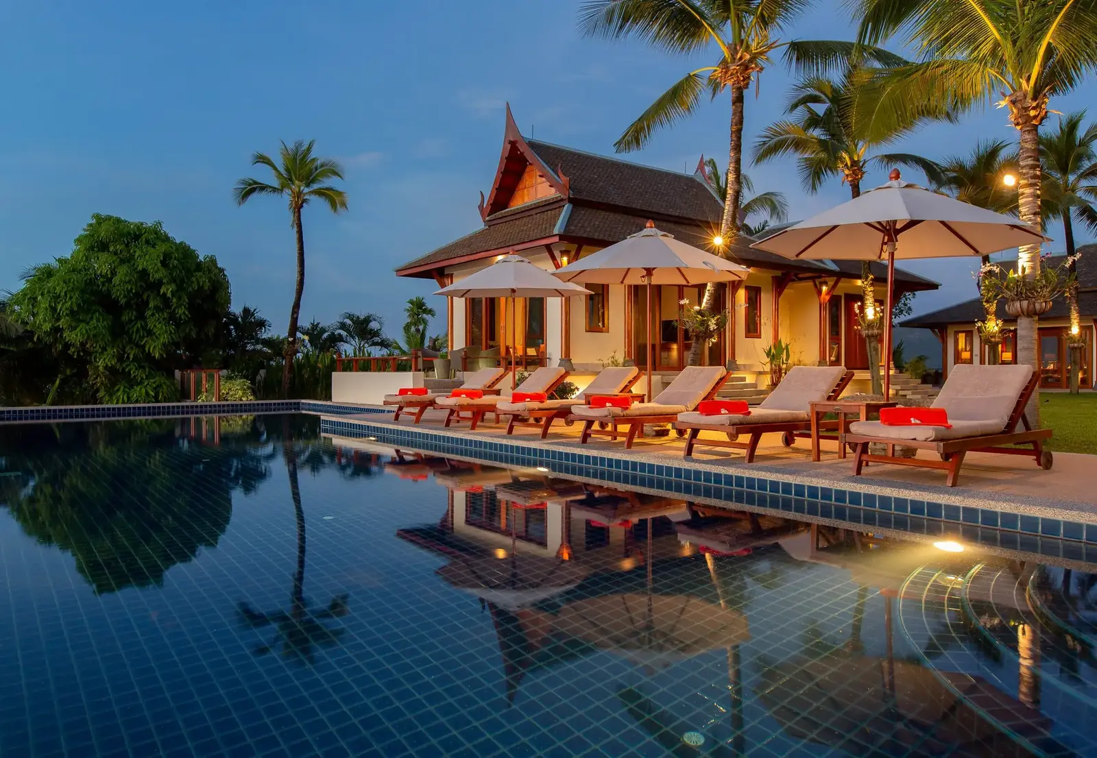 Infinity pool and pavilion at blue hour