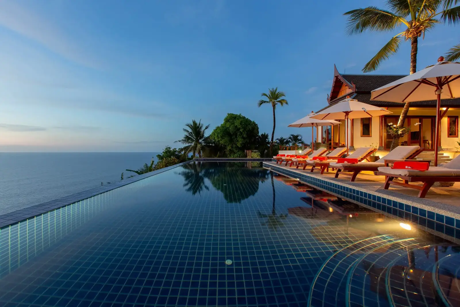 Infinity pool at blue hour toward the ocean