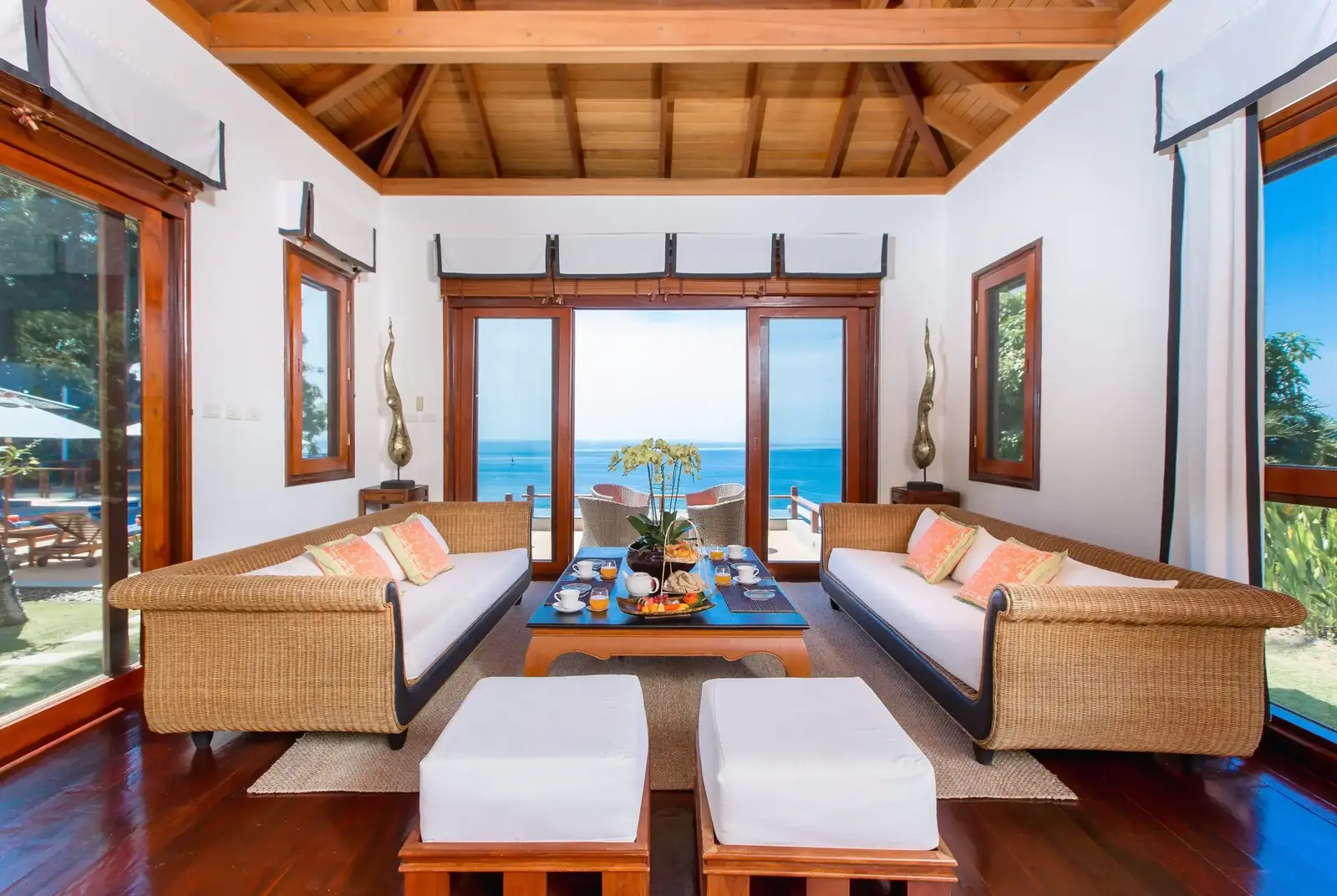 Living pavilion lounge opening to the pool