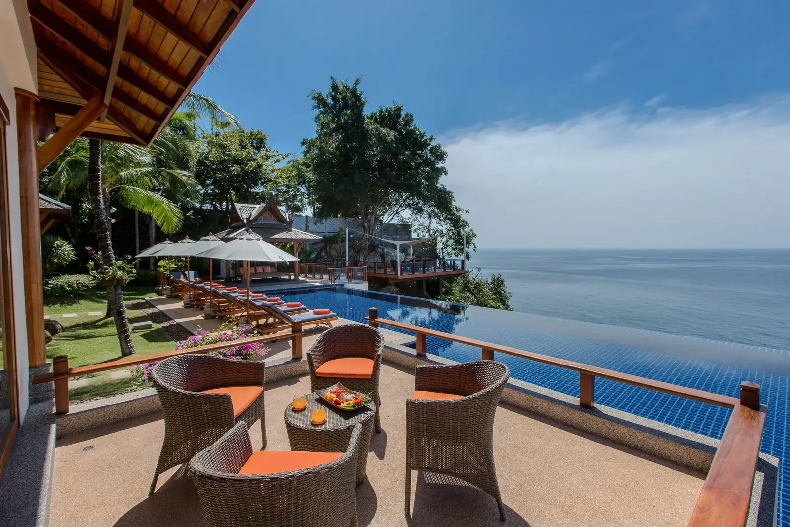 Poolside sala seating overlooking the Sea